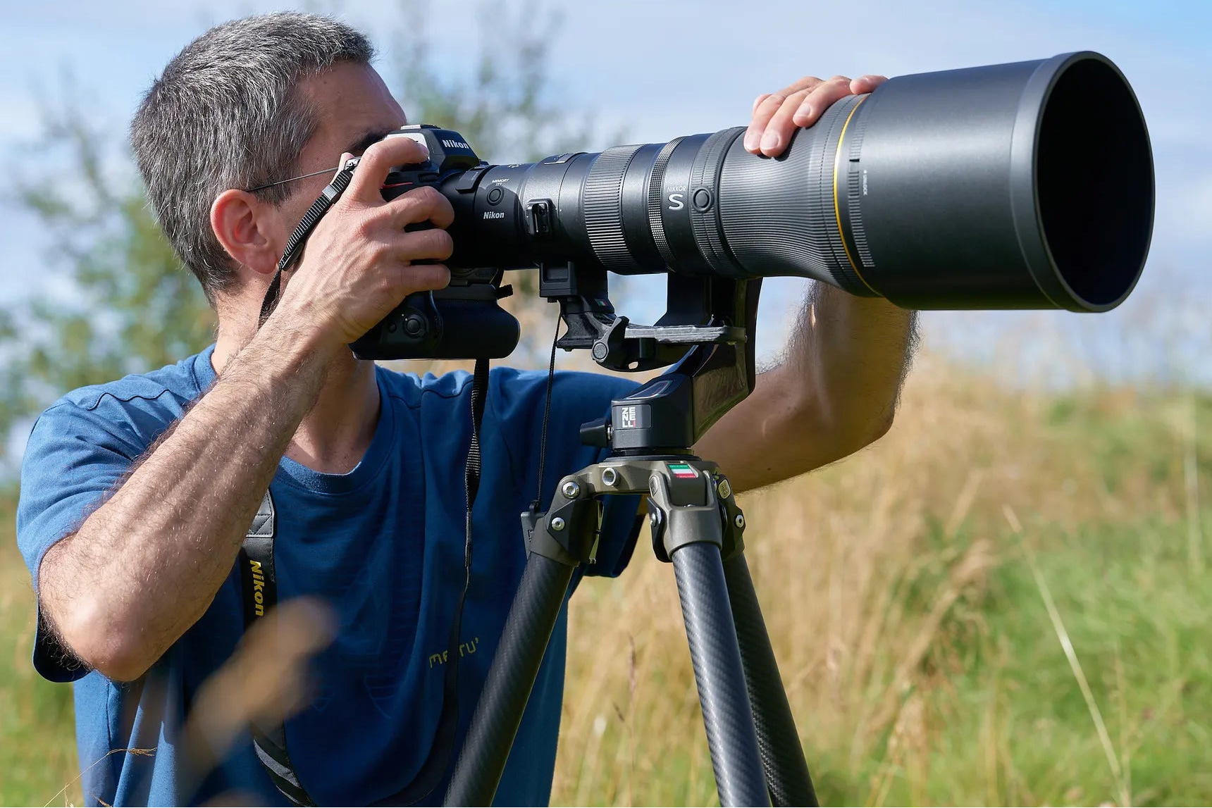 Carbon fiber tripod for wildlife photographers, designed for maximum stability with heavy telephoto lenses in demanding outdoor environments.