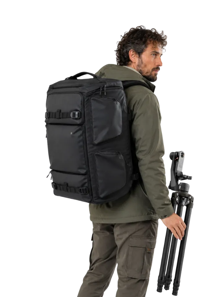 Professional wildlife photography setup featuring a carbon fiber tripod, gimbal head and outdoor camera backpack designed for 400mm, 600mm and 800mm telephoto lenses.