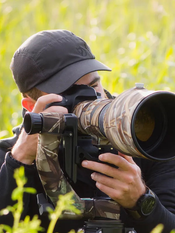 gimbal head covered with camouflage fabric for wildlife photography setup