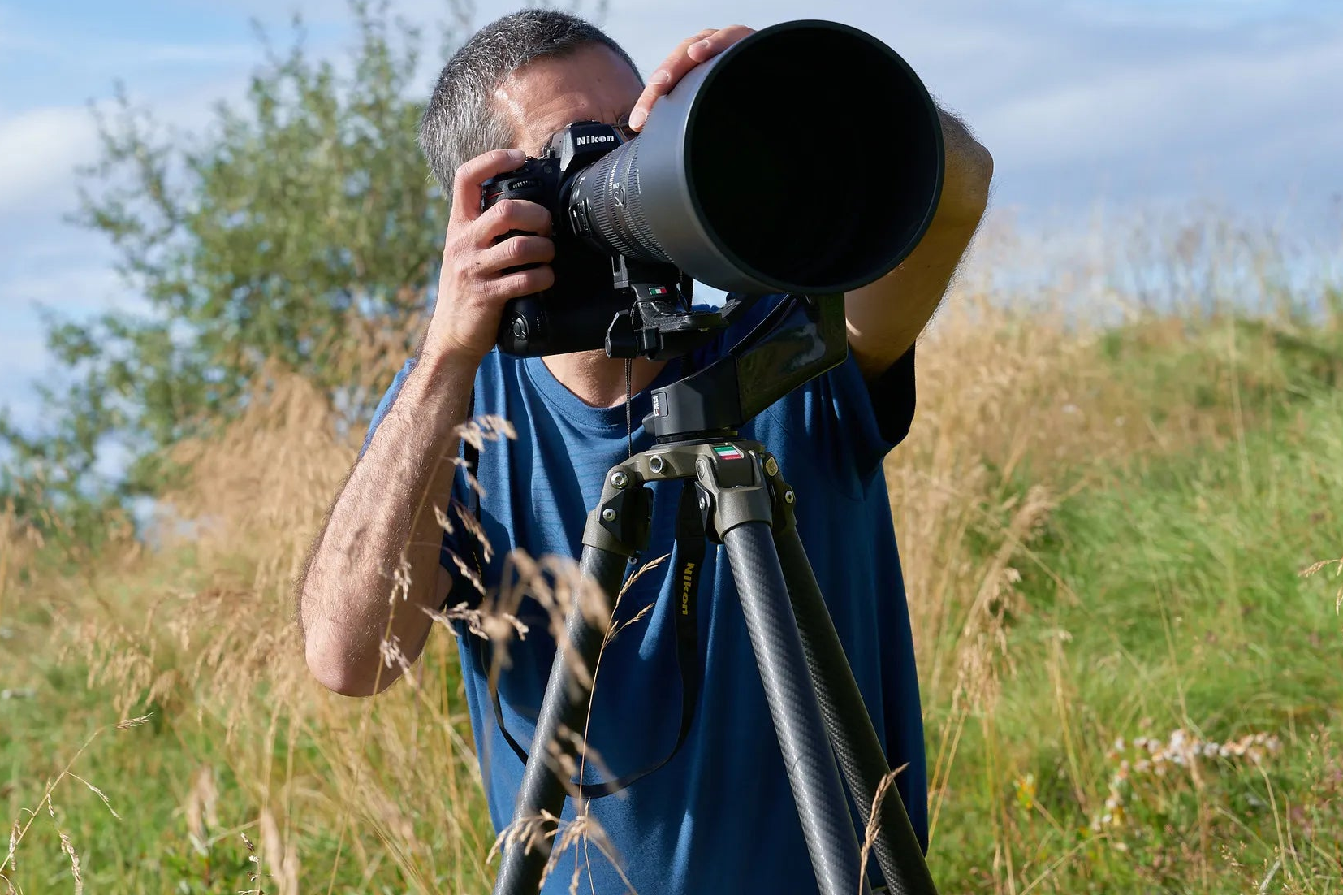 Carbon fiber photography tripod and monopod in rugged wilderness environment, professional camera support for 400mm, 600mm and 800mm telephoto lenses.