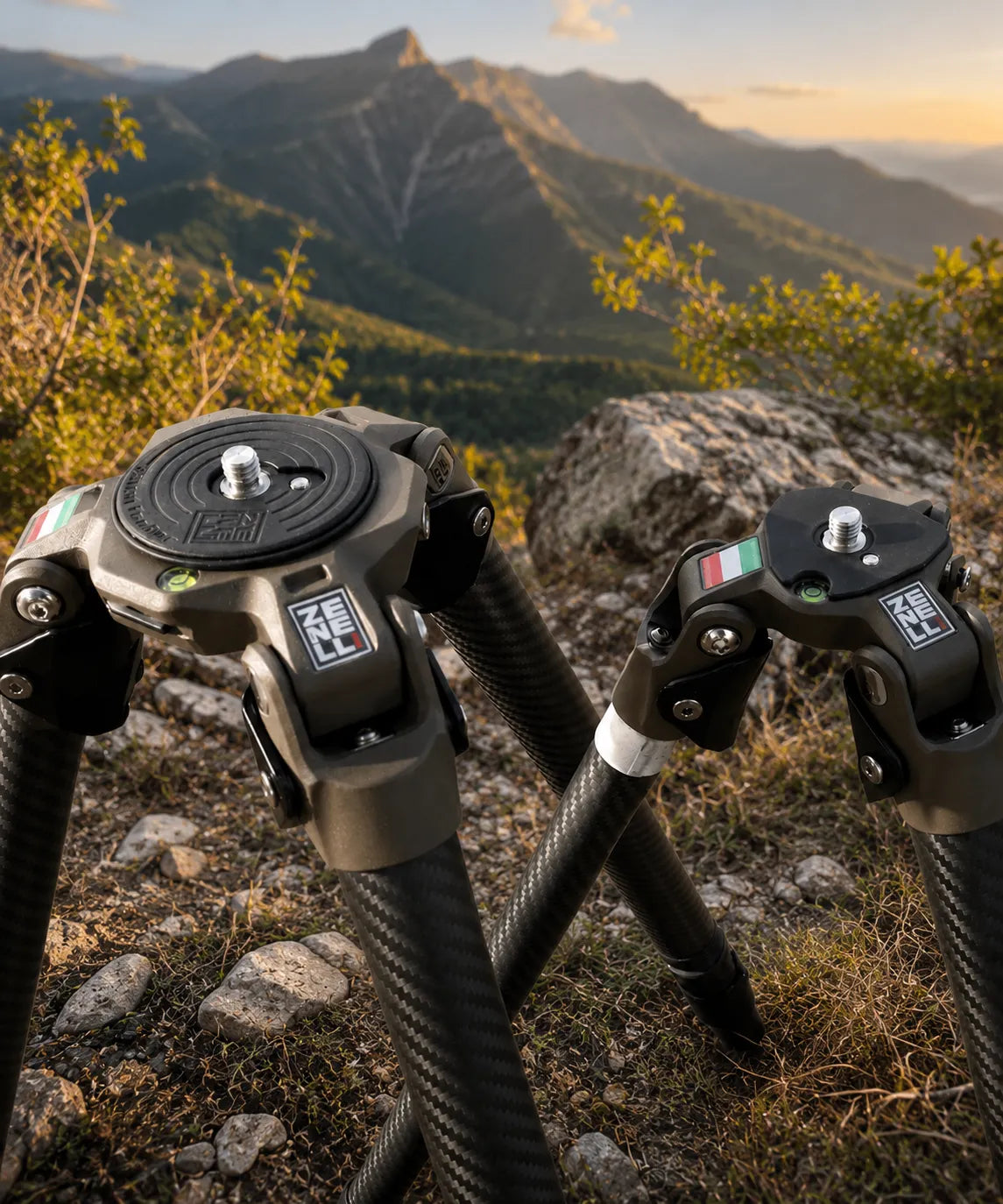 Zenelli carbon fiber tripod and monopod in mountain landscape at sunset, lightweight professional support system for wildlife photography with telephoto lenses.